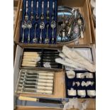 Contents to two trays - boxed set of plated napkin rings, boxed sets of cutlery, etc,