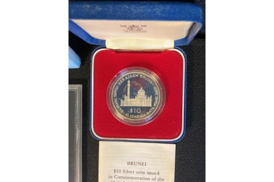 A Brunei Ten Dollars Silver coin issued in commemoration of the 10th Anniversary of the Brunei - Image 3 of 3