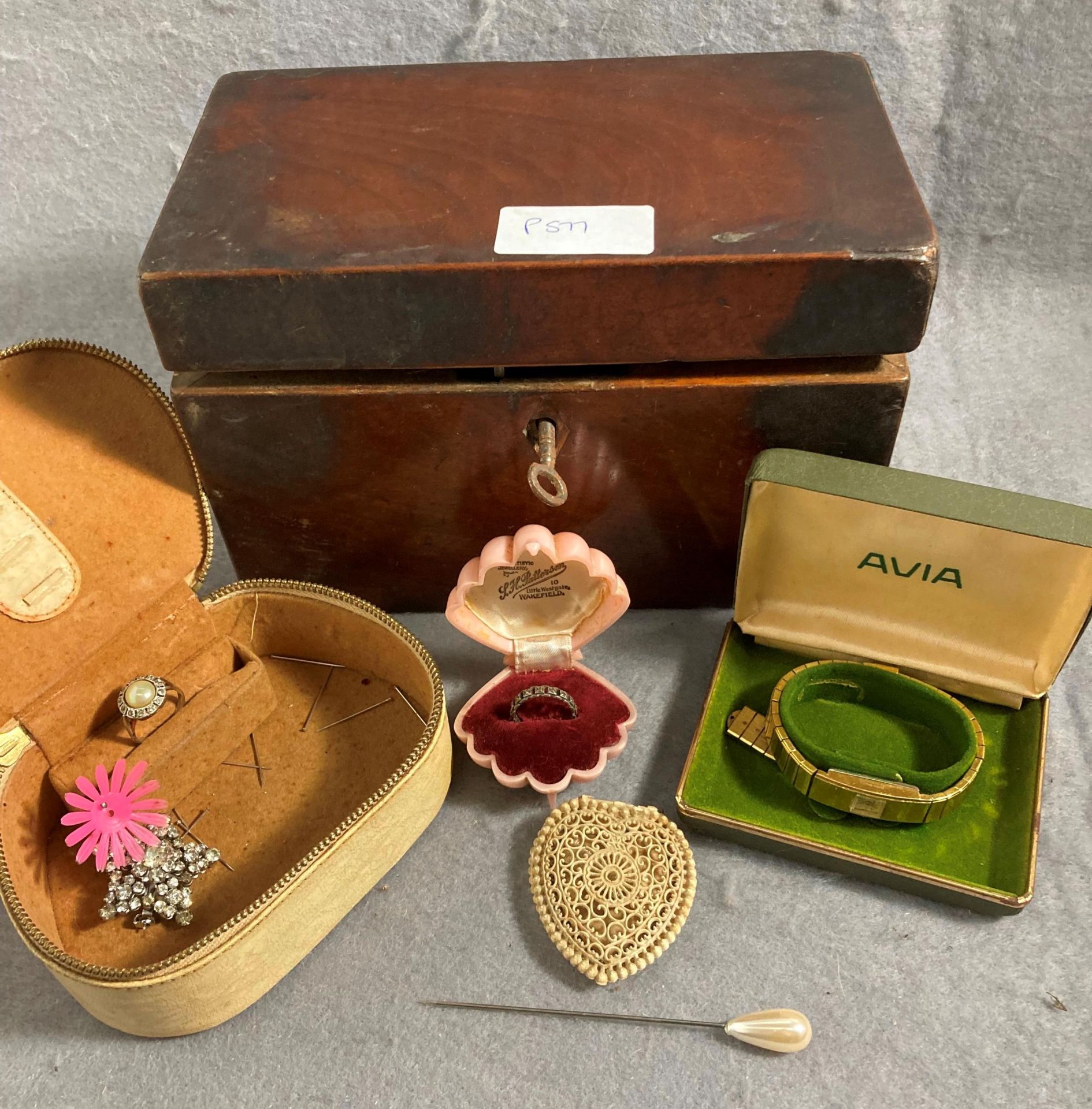 A small wooden jewellery box with Avia gold plated lady's wristwatch and small quantity costume