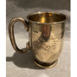 A silver tankard engraved to Bob thanking him for his many years of service from Old Leos 1960,