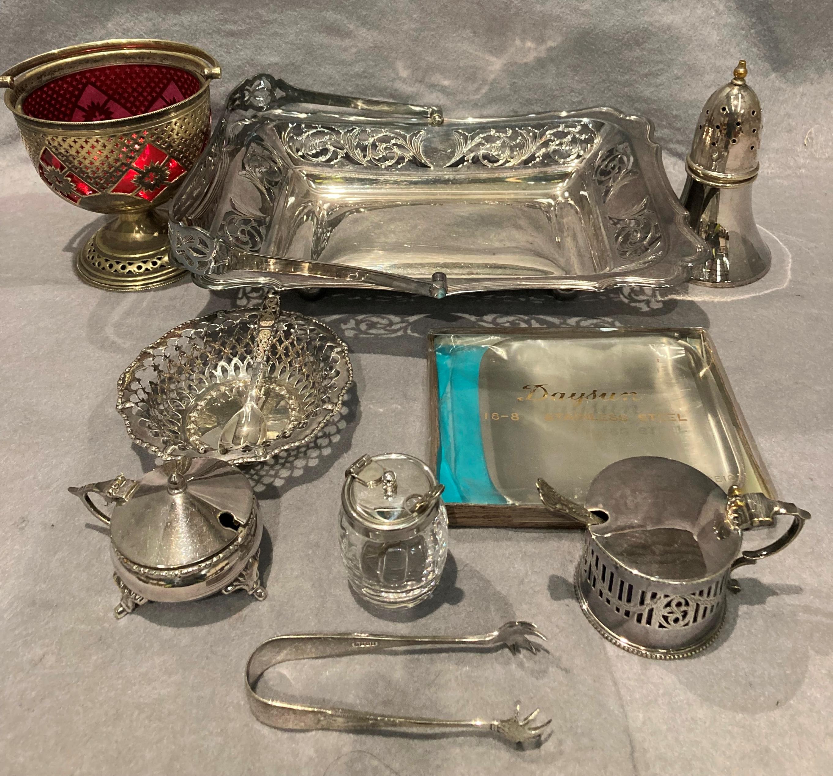 Contents to tray - a quantity of plated items, single handled tray, sugar shaker,