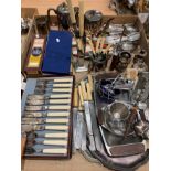 Contents to tray - a large collection of plated ware and stainless steel cutlery including a cased