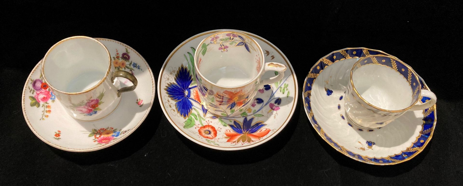 Three patterned cups and saucers - Image 2 of 3