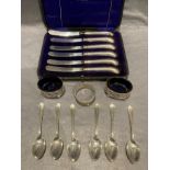 A set of six silver handled butter knives in a fitted case, case inscribed Fattorini & Son,