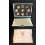 A Royal Mint Coinage of Great Britain and Northern Ireland 1984 proof set in blue deluxe case