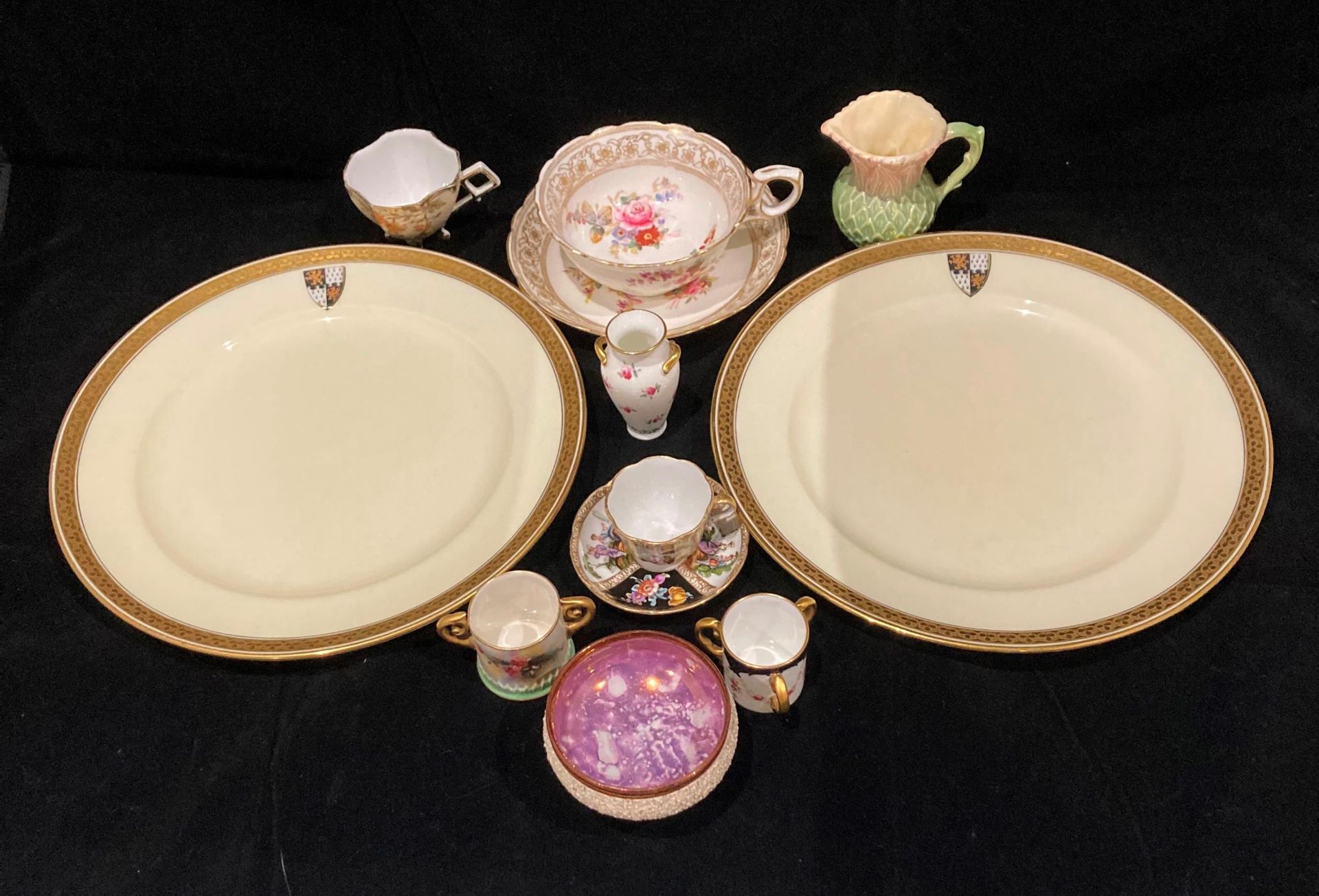 Contents to tray - two Cauldon cream plates with gilt rim and crest,