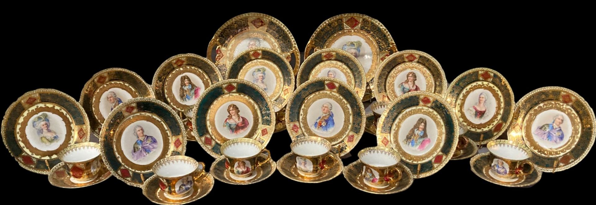 A Royal Vienna service of twelve cups and saucers, twelve side plates and two large plates,