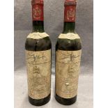 Two 75cl bottles of 1962 Chateau Mouton Rothschild No 115485 and 109768 - advised stored cellared