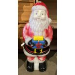 A moulded plastic illuminating Father Christmas,