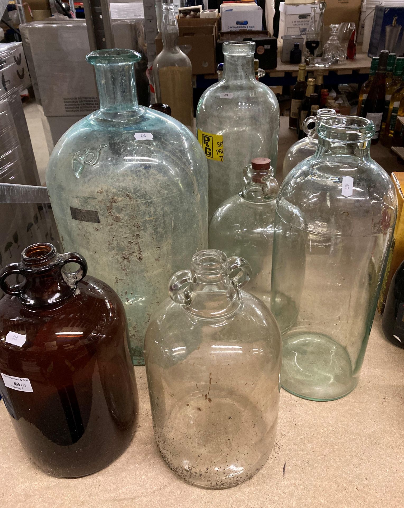Ten various demijohn's and large glass jars