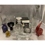 Two glass decanters, glass vases,