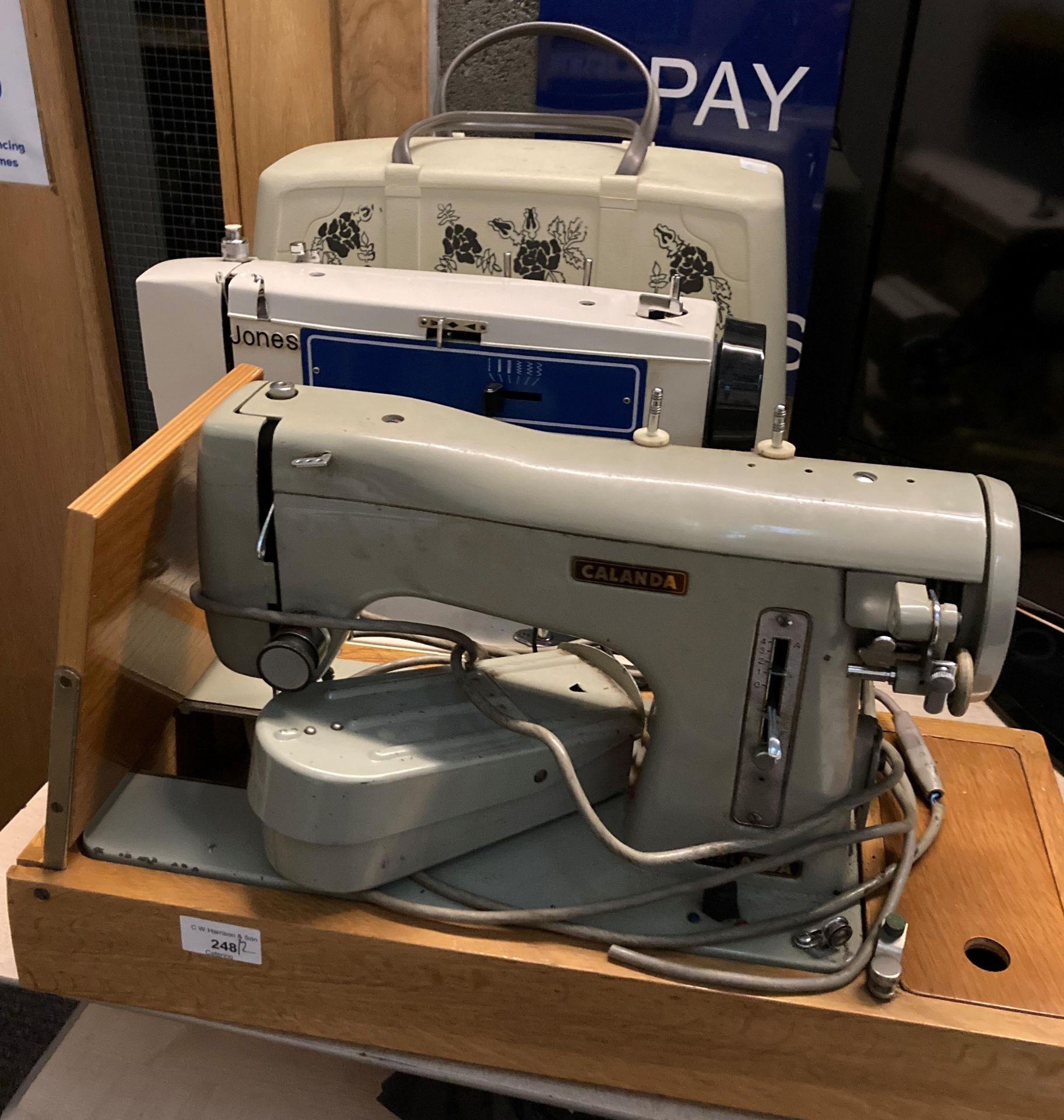A Jones 240v portable sewing machine complete with case - no lead (not PAT tested) and a Calenda