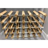 A metal and wood 30 bottle wine rack - no contents