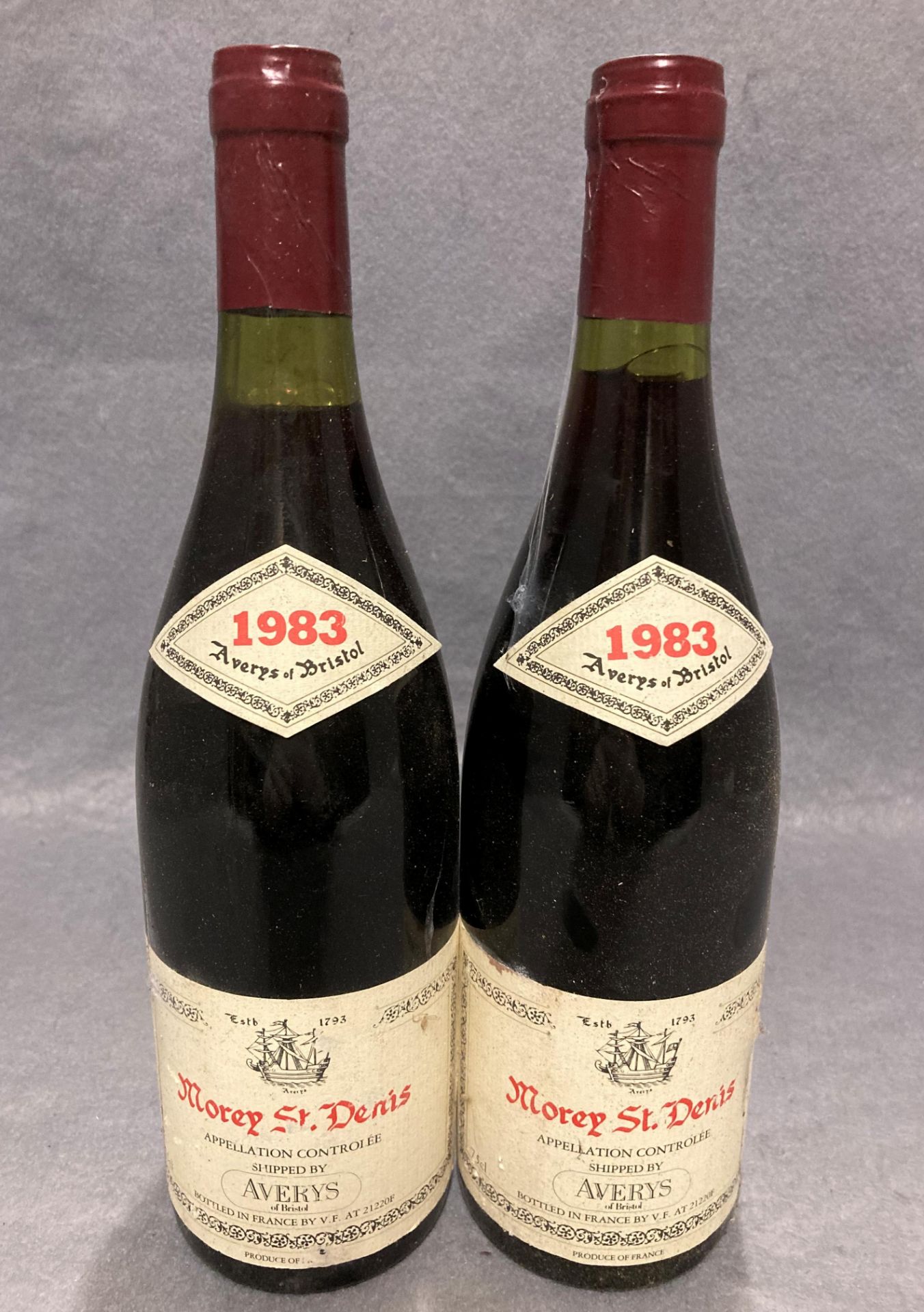 Twelve 75cl bottles of Morey St Denis 1983 red wine - shipped by Averys of Bristol - advised stored