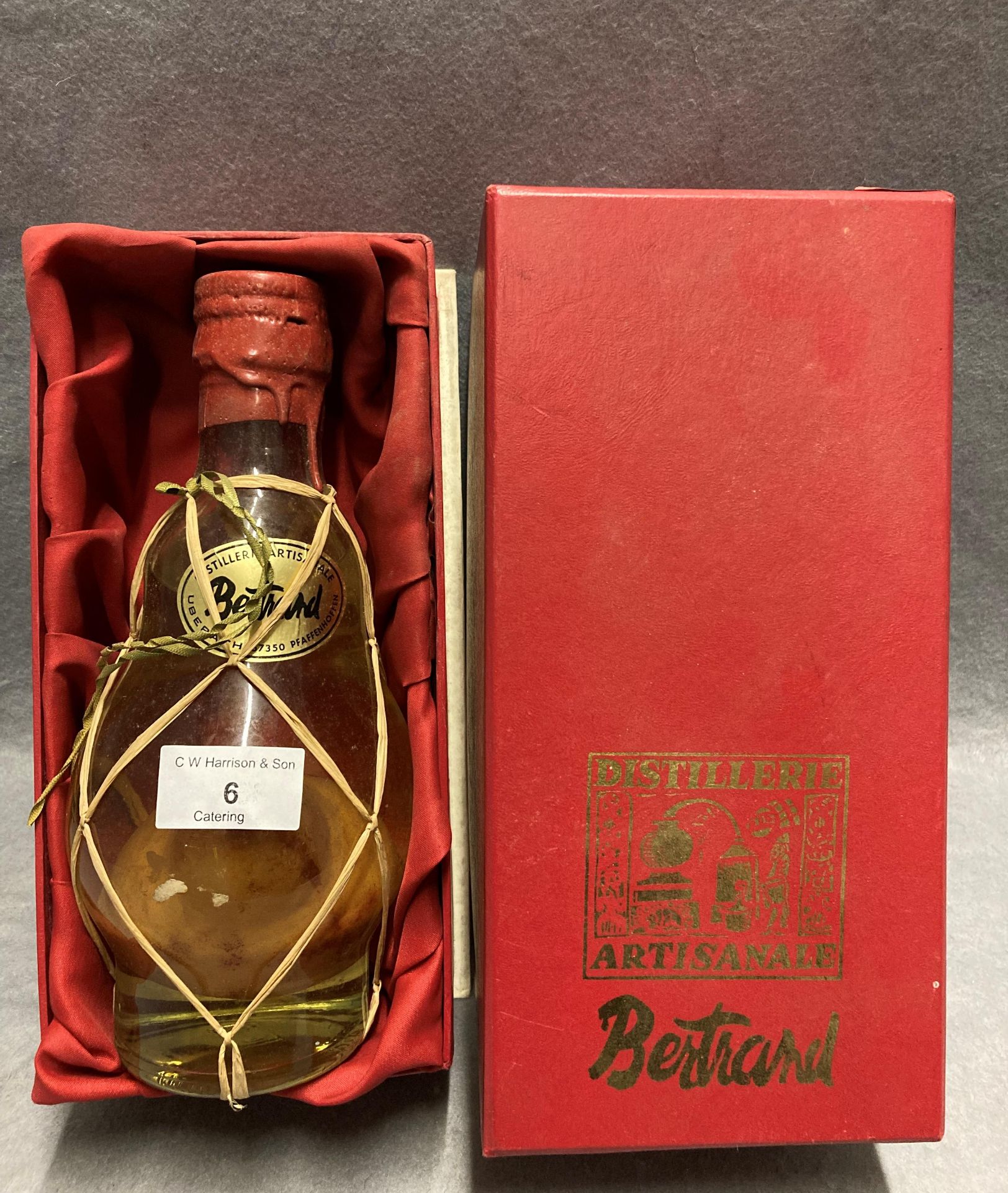 A boxed bottle of Bertsand Distillerie Artisanale pear liquor