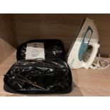 A Morphy Richards Breeze steam iron (Model: 40211) and a Nicky Clarke home hair cutting set (2)