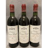 Three bottles of Chateau Fourcas Dupre Listrac-Medoc 1983 red wine - advised stored in a cellar