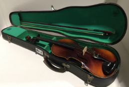 Violin as seen with new bridge and scratches 56 CM long,