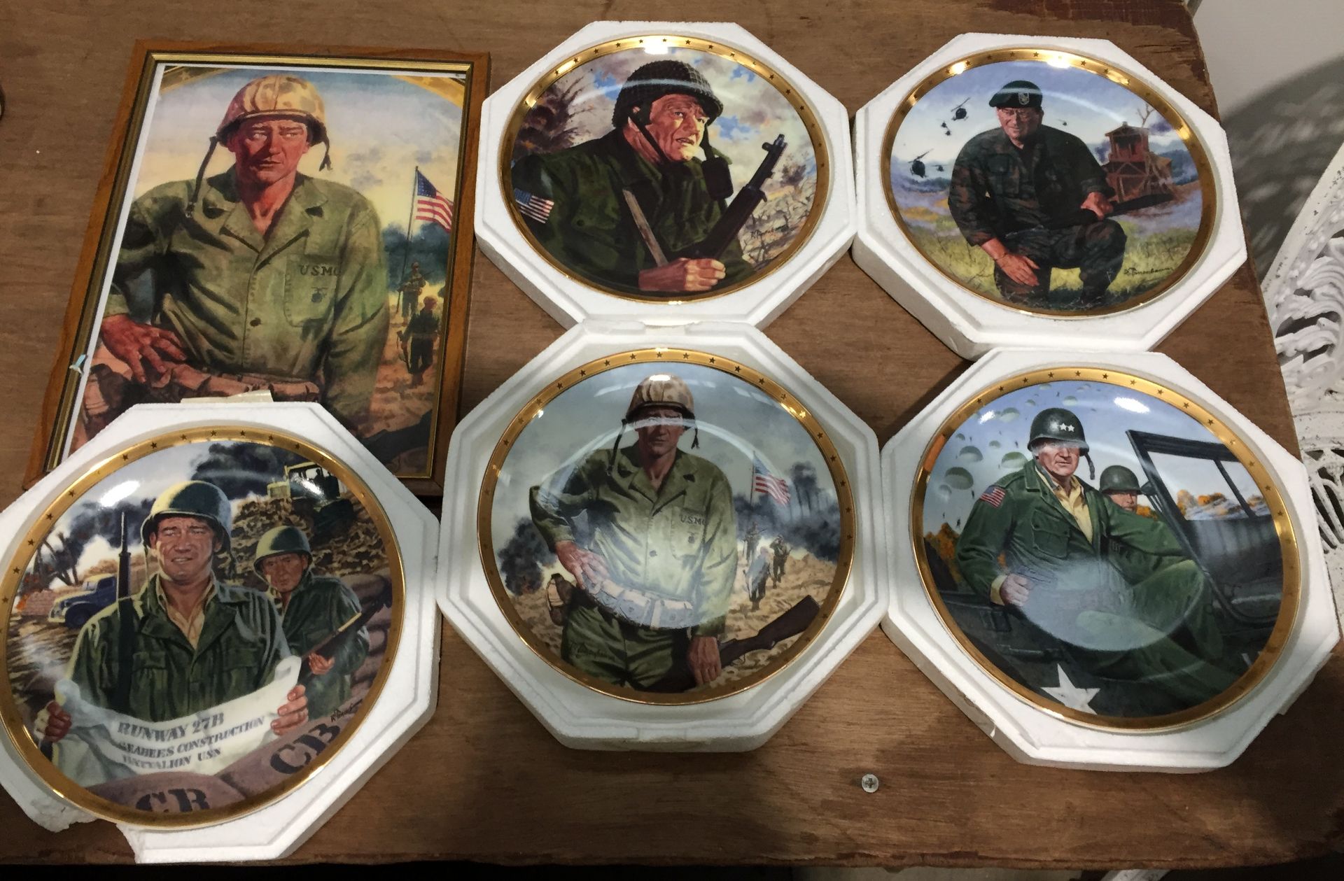 6 John Wayne items - 5 x Royal Doulton plates soldier scenes & framed print of "Symbol of America's