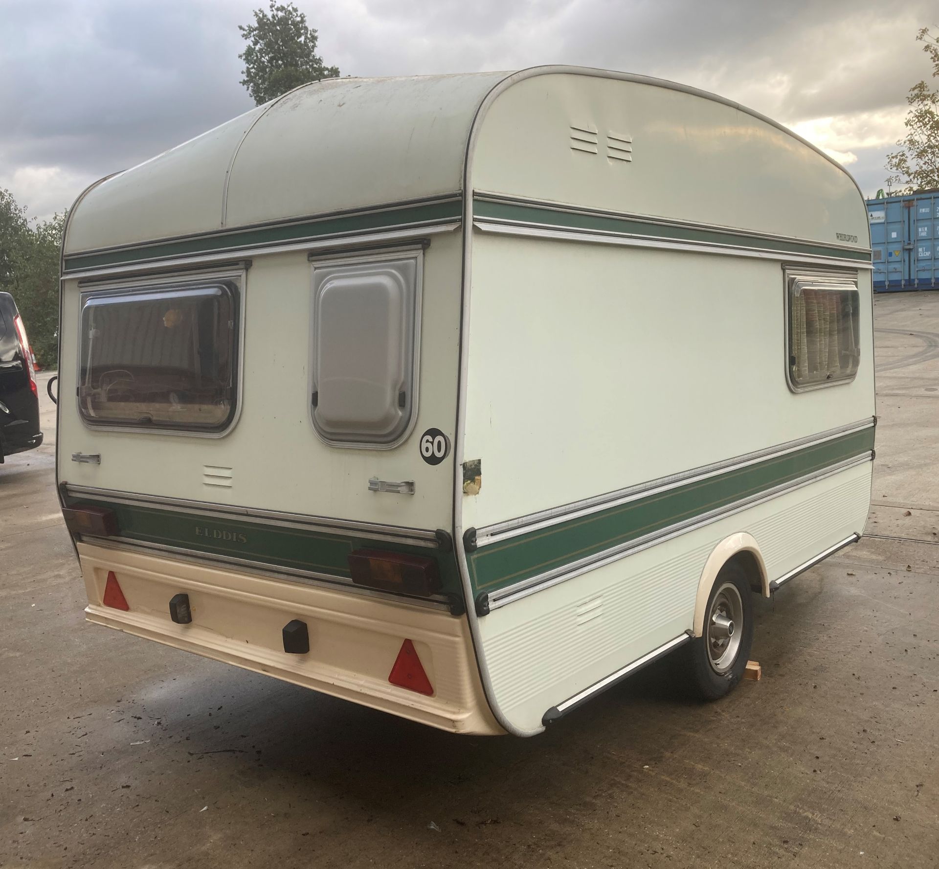 AN ELDDIS WHIRLWIND TWO BERTH TOURING CARAVAN - White with green trim. Serial No: 11344E. - Image 8 of 8