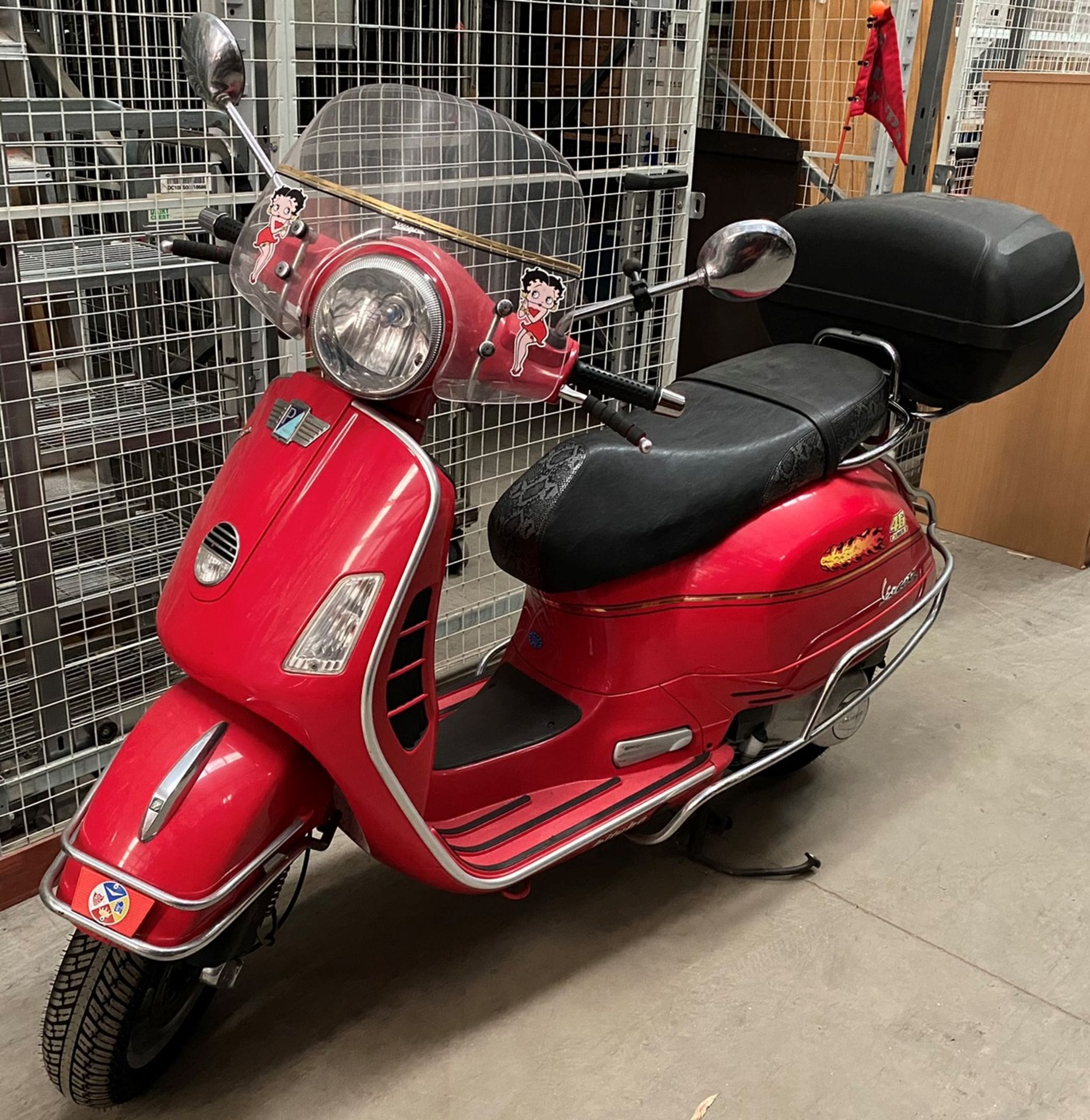 A PIAGGIO VESPA GTS (244cc) SCOOTER - Petrol - Red. Reg No: GN06 HJA. Recorded Mileage: 46,952+km.