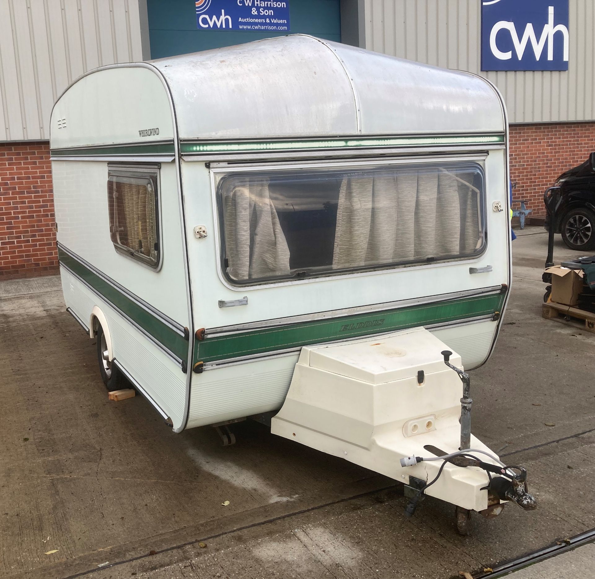 AN ELDDIS WHIRLWIND TWO BERTH TOURING CARAVAN - White with green trim. Serial No: 11344E. - Image 6 of 8