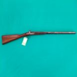 A percussion double barrel shotgun with 26" barrels of approx 14 bore,