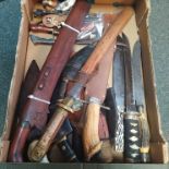 A collection of twenty five various knives including Bowies, Kukri,