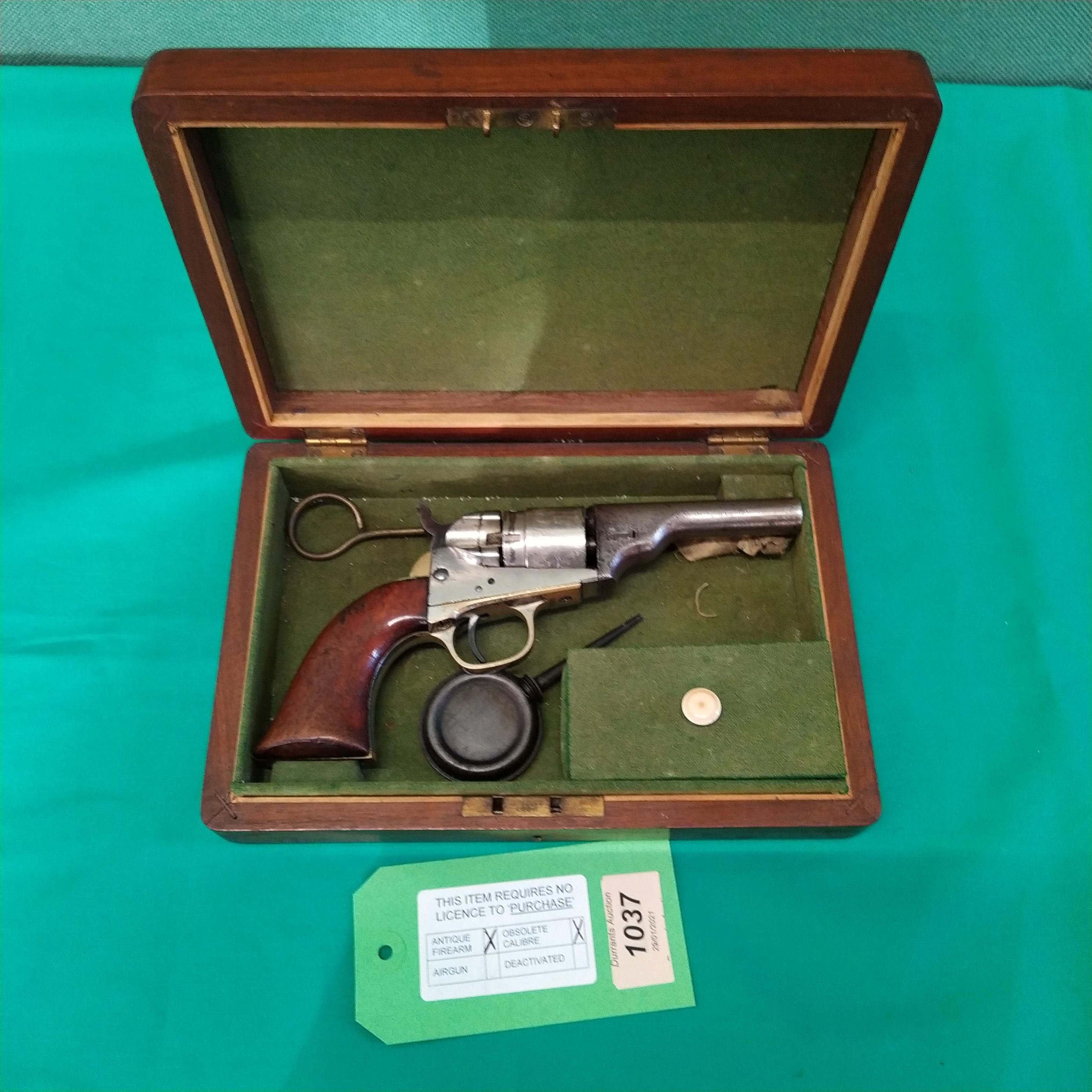 A Colt revolver with a 3 1/2" round (cartridge) barrel in .