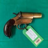 A deactivated WWI era brass flare pistol by Cogswell & Harrison Ltd dated March 1916,