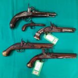 Five various single shot pistols, one Flintlock,
