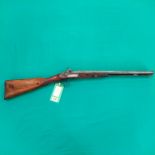 A percussion double barrel shotgun with 20 1/2" barrels of approx 16 bore, two stage action working,