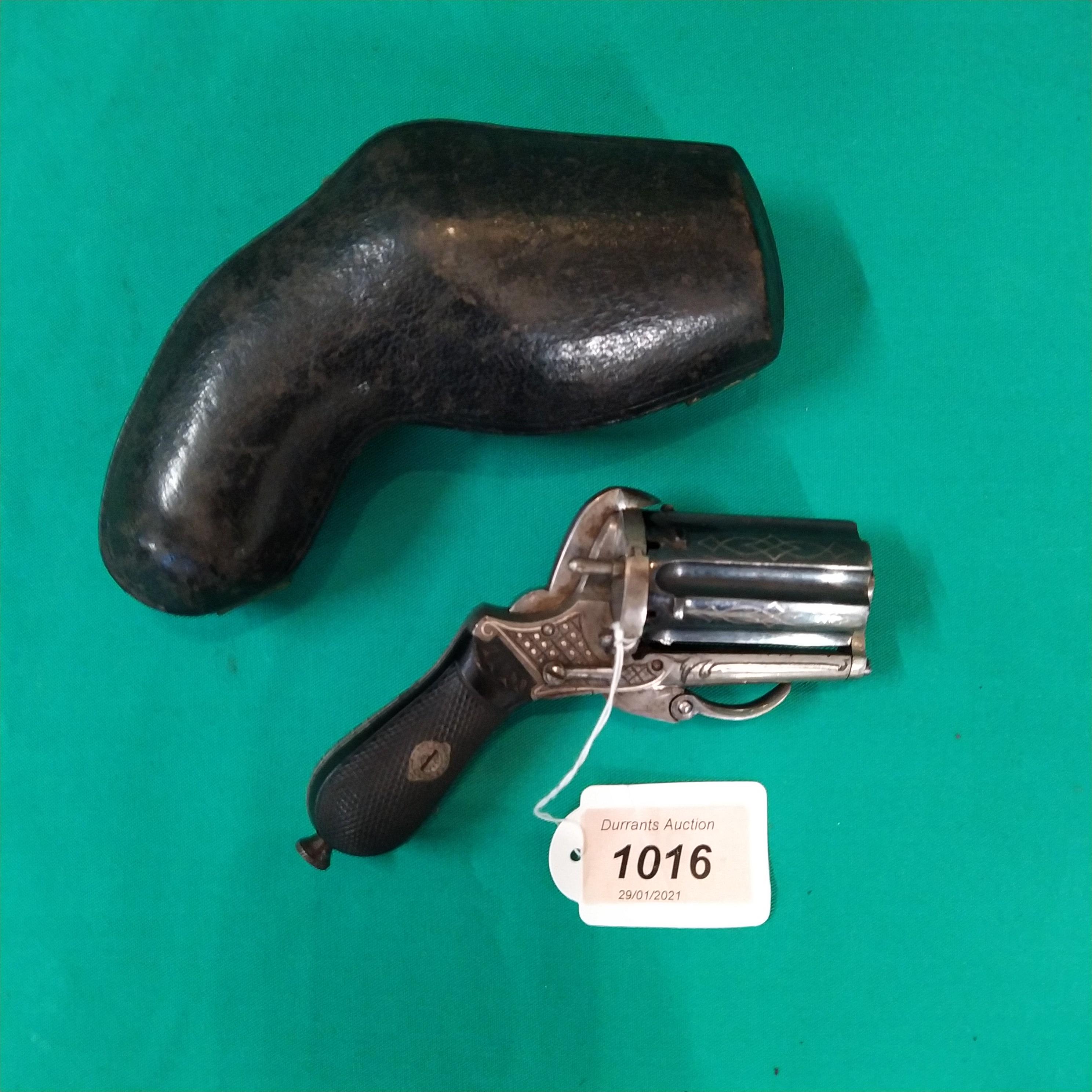 A fine six shot 7mm pin fire pepperbox revolver with its original hard 'purse' style case,