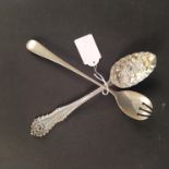 A silver berry spoon (marks indistinct) together with a silver salad server, Sheffield 1927,