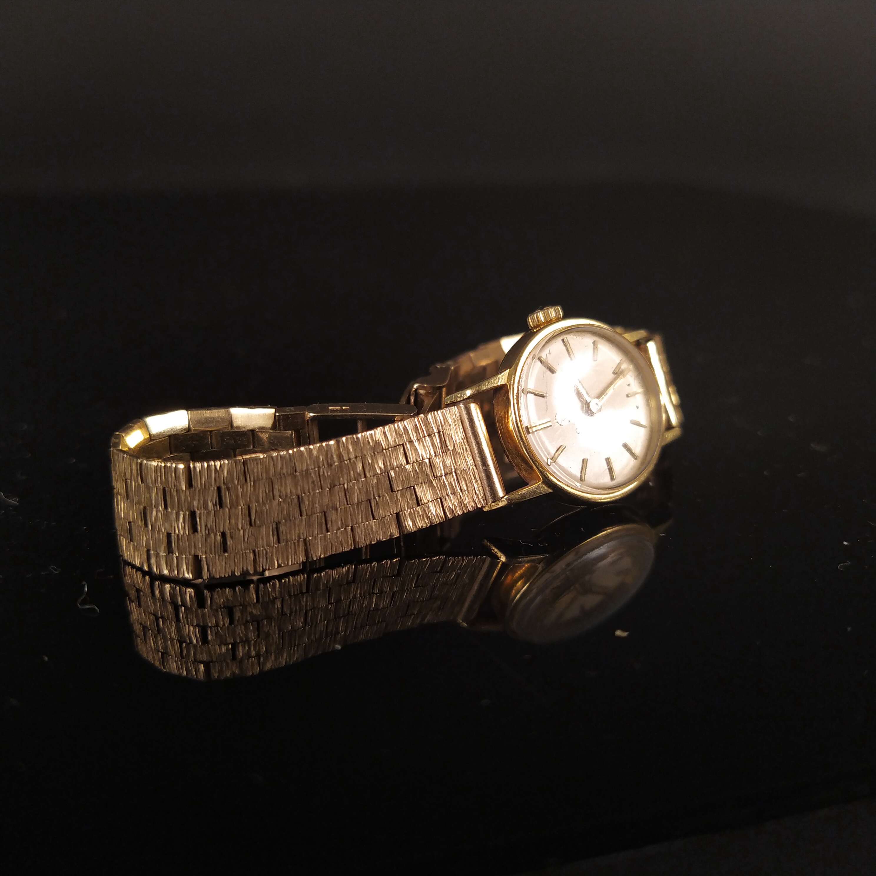 A lady's 18ct gold Omega watch on 9ct gold bark effect strap - Image 3 of 3