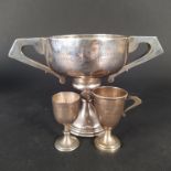 A twin handled silver trophy with presentation inscription,