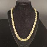 A 14ct gold graduating rope effect necklace (possibly replacement clasp), approx 37.