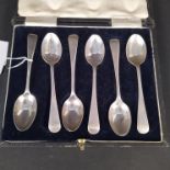 Six silver teaspoons (five matching),