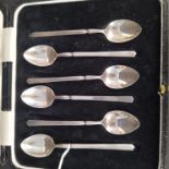 A cased set of six silver Art Deco teaspoons, hallmarked Birmingham 1932,