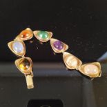 A vintage 9ct gold hardstone set panel bracelet,