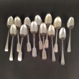 Thirteen various Georgian and Victorian table spoons including Exeter hallmark,