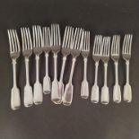 A set of six silver table and side forks, all hallmarked London 1932 by Josiah Williams & Co,