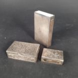 A large silver matchbook holder with engine turned decoration,