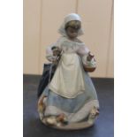 A boxed and signed by a member of the Lladro family,