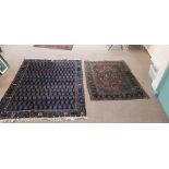 Two vintage wool Persian rugs, one on blue ground 6.