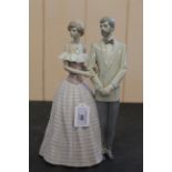 A boxed Lladro porcelain figurine group, 5540 'An Evening Out',