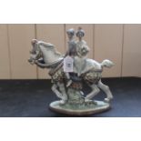 A Lladro porcelain figure group of a Valencian couple on horseback,