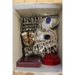 A mixed lot of silver plated items including bottle coasters, toast racks,