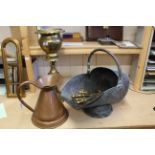 A 19th Century copper coal scuttle, a brass four piece companion set,