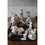 Eleven Lladro porcelain figurines dating from the 1980's/90's including Father Christmas,